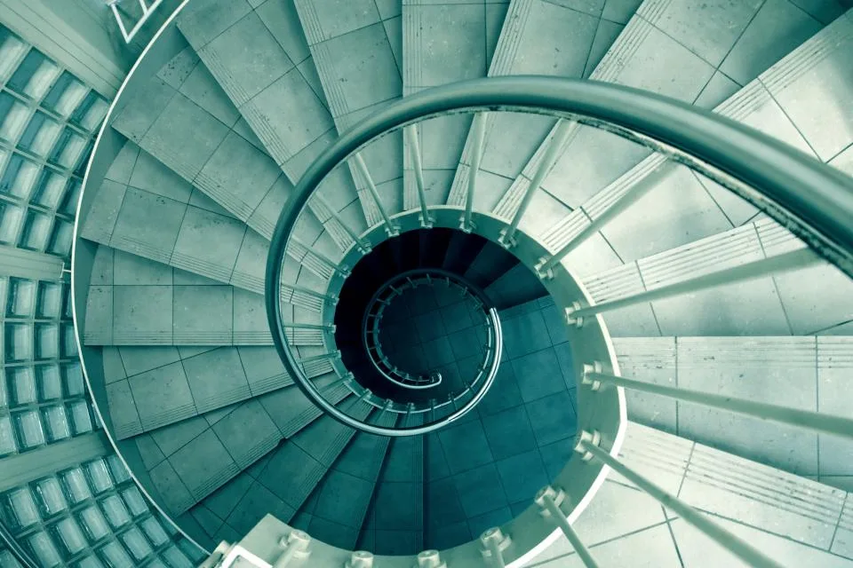 Layered architectural stairs forming a repeating pattern